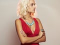 Young beautiful woman.Sexy body Blond girl in red dress Royalty Free Stock Photo