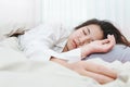 Young beautiful woman sleeping her bed Royalty Free Stock Photo