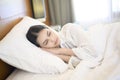 Young beautiful woman sleeping in her bed at home Royalty Free Stock Photo