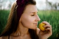 Young Beautiful Woman Smelling Lemon In Park. Royalty Free Stock Photo