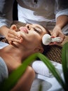 Young beautiful woman in spa environment. Royalty Free Stock Photo