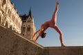 Young beautiful woman in sports outfits doing stretching before workout outdoor on urban street. Fit body and mental Royalty Free Stock Photo