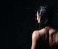 Young beautiful woman standing under the rain water drops water Royalty Free Stock Photo