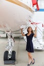 Young beautiful woman and Luxury business jet Royalty Free Stock Photo