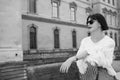 Young beautiful woman in sunglasses walking in Paris, France