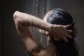 Young beautiful woman taking shower in a bathroom at home Royalty Free Stock Photo