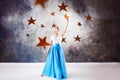 Young beautiful woman took a star from the sky. Fantasy concept, Reach for the dream Royalty Free Stock Photo