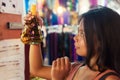 Young beautiful woman tourist shopping in night market in city siem reap, Cambodia Royalty Free Stock Photo