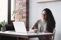 Young beautiful woman using laptop at home, Businesswoman or student working online on computer indoors, e-learning concept Royalty Free Stock Photo