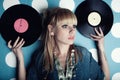 Young beautiful woman with vinyl records Royalty Free Stock Photo