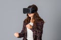 Young beautiful woman in virtual reality helmet Royalty Free Stock Photo