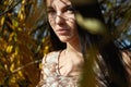 Young beautiful woman walking in autumn forest Royalty Free Stock Photo