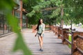 Young beautiful woman walking in the park.