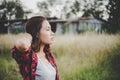 Young beautiful woman walking through in summer field, Freedom e Royalty Free Stock Photo