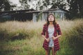 Young beautiful woman walking through in summer field, Freedom e Royalty Free Stock Photo