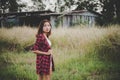 Young beautiful woman walking through in summer field, Freedom e Royalty Free Stock Photo