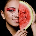 Young beautiful woman and watermelon portrait Royalty Free Stock Photo