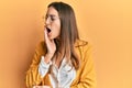 Young beautiful woman wearing business style and glasses bored yawning tired covering mouth with hand Royalty Free Stock Photo
