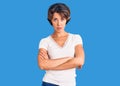 Young beautiful woman wearing casual clothes skeptic and nervous, disapproving expression on face with crossed arms Royalty Free Stock Photo