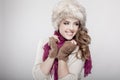 Young beautiful woman wearing fur hat and scarf Royalty Free Stock Photo