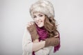 Young beautiful woman wearing fur hat and scarf Royalty Free Stock Photo