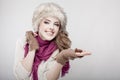 Young beautiful woman wearing fur hat and scarf Royalty Free Stock Photo