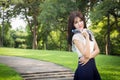 Young beautiful woman wearing white shirts drinking water at su Royalty Free Stock Photo