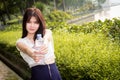 Young beautiful woman wearing white shirts drinking water at su Royalty Free Stock Photo