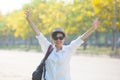 Young beautiful woman wearing white shirts ,straw hat and sun gl Royalty Free Stock Photo