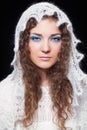 Young beautiful woman in white knitted openwork scarf Royalty Free Stock Photo