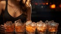 Young beautiful woman working as a bartender in a nightclub bar Royalty Free Stock Photo