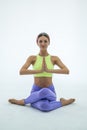 Young beautiful woman yoga posing isolated over white studio background. Royalty Free Stock Photo