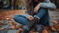 Young beautiful woman zips up her boots Royalty Free Stock Photo