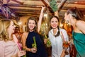 Young beautiful women with cocktails in bar or club Royalty Free Stock Photo