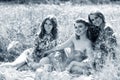 Young beautiful women on picnic in summer park. Royalty Free Stock Photo
