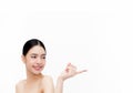 Young beauty Asian woman pointing finger on empty white copy space isolated over white background Royalty Free Stock Photo