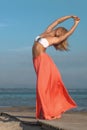 young athletic woman jumping and running on the beach Royalty Free Stock Photo