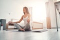 Charming brunette girl meditating in the morning