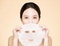 Young beauty face and facial mask Royalty Free Stock Photo