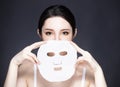 young beauty face and facial mask Royalty Free Stock Photo