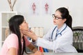 Young beauty female doctor touching patient Royalty Free Stock Photo