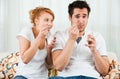 Young, beauty girl and boy eating yoghurt