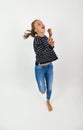 girl flying in jump with brown hair Royalty Free Stock Photo