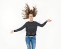 Young beauty girl flying in jump with brown hair Royalty Free Stock Photo