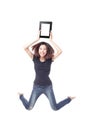 Young beauty happy jump and showing tablet pc Royalty Free Stock Photo