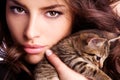 Young beauty with kitten