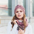 Young beauty outdoor portrait with autumn park in background hat. Royalty Free Stock Photo