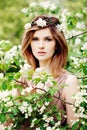 Young Beauty. Pretty Woman in Flowers Wreath Outdoor Royalty Free Stock Photo