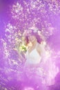Young beauty woman in blooming garden Royalty Free Stock Photo