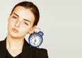 Young beauty woman in business style costume waking up for work early morning on white background Royalty Free Stock Photo